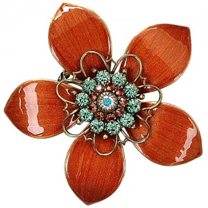 A brooch is one of the top ten essential jewelry pieces