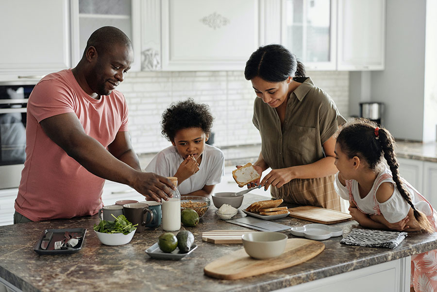 A Family Cooking Dinner Together