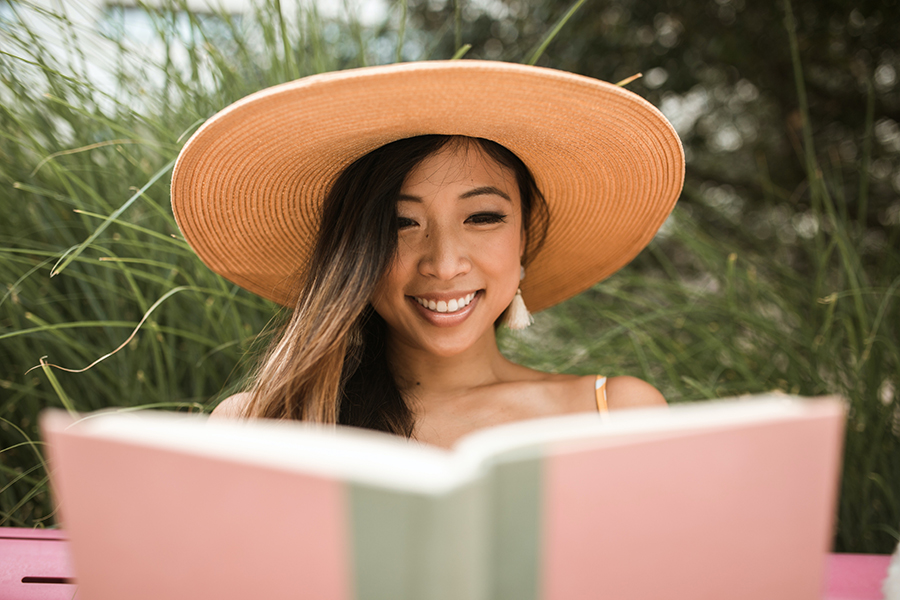 Person Reading a Book Outside